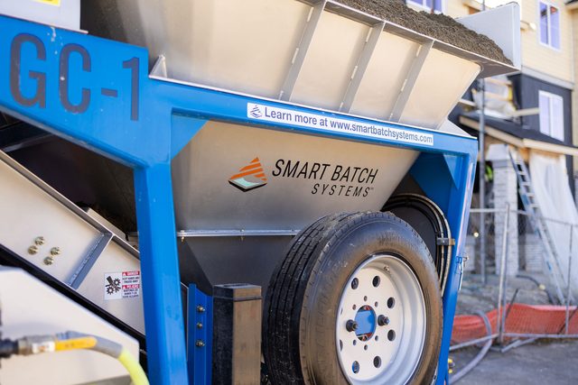 GC-1 lettering and Smart Batch branding on the sand hopper