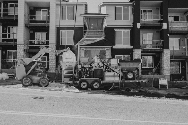 The Smart Batch GC-1 and jobsite scene in documentary black and white
